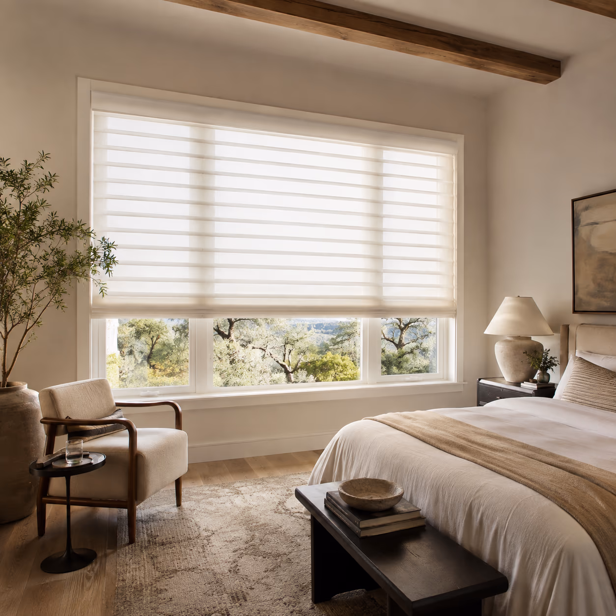 Flat Fold Vignette Modern Roman Shades across a wide bedroom window, the fabric held taut between crisp horizontal folds — installed by Discount Best Blinds of Santa Rosa, CA.